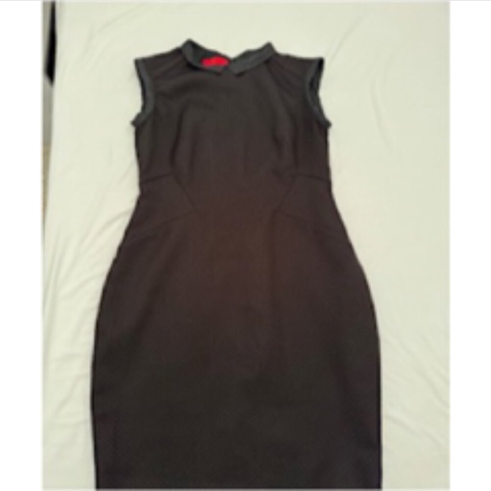 Carolina Herrera black dress and jacket